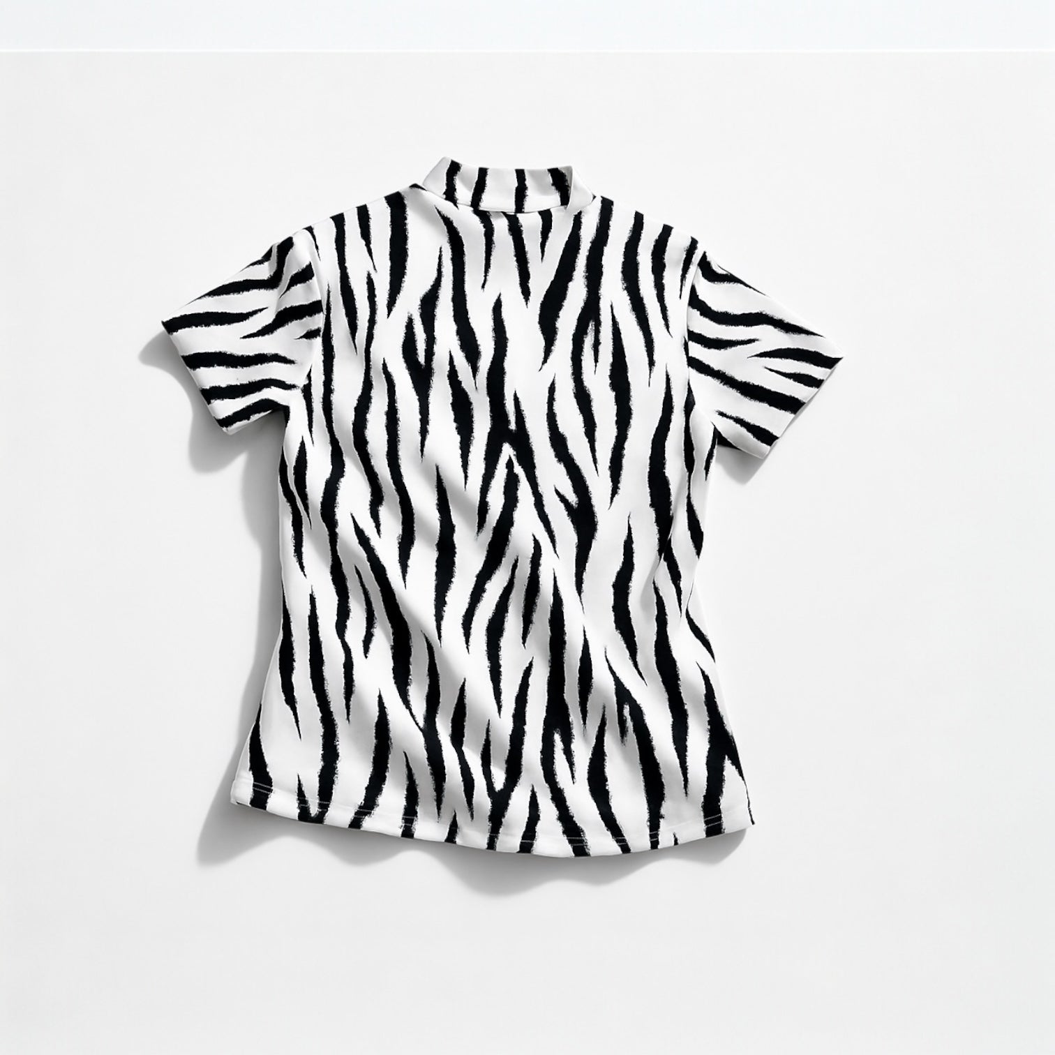 Ladies Animal Mock Neck Zebra レディースゴルフウェア アニマル モックネック ゼブラ 半袖 春夏 高ストレッチ 肌触り柔らか 速乾 UVカット レディース ホワイト アニマル柄 オシャレ 可愛い ゴルフ女子 おすすめ プレゼント